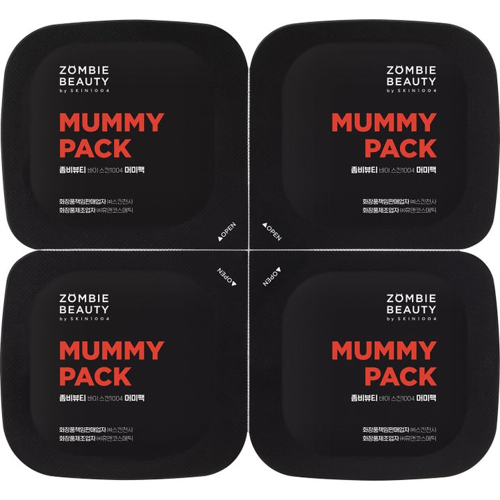 SKIN1004 Zombie Beauty Mummy Pack 8 stk opstrammende ansigtsmaske i sorte firkantede kapsler med orange tekst
