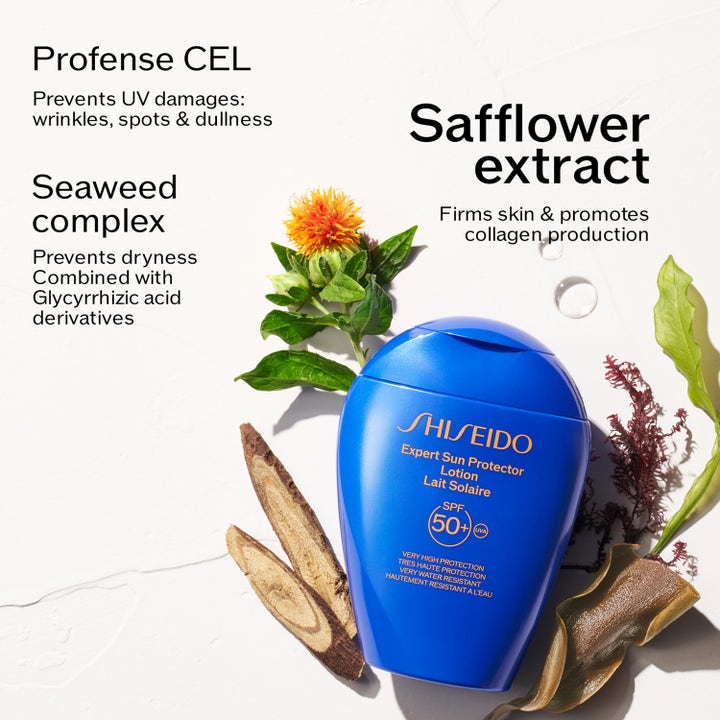 Shiseido Global Sun Care Lotion 300 ml solcreme med SPF 50 i blå flakon omgivet af safflor og tang.