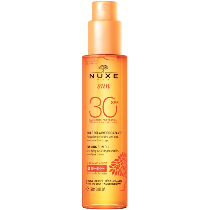 Nuxe Sun Tanning Sun Oil 150 ml sololie SPF 30 giver anti-age beskyttelse i en orange gennemsigtig sprayflaske