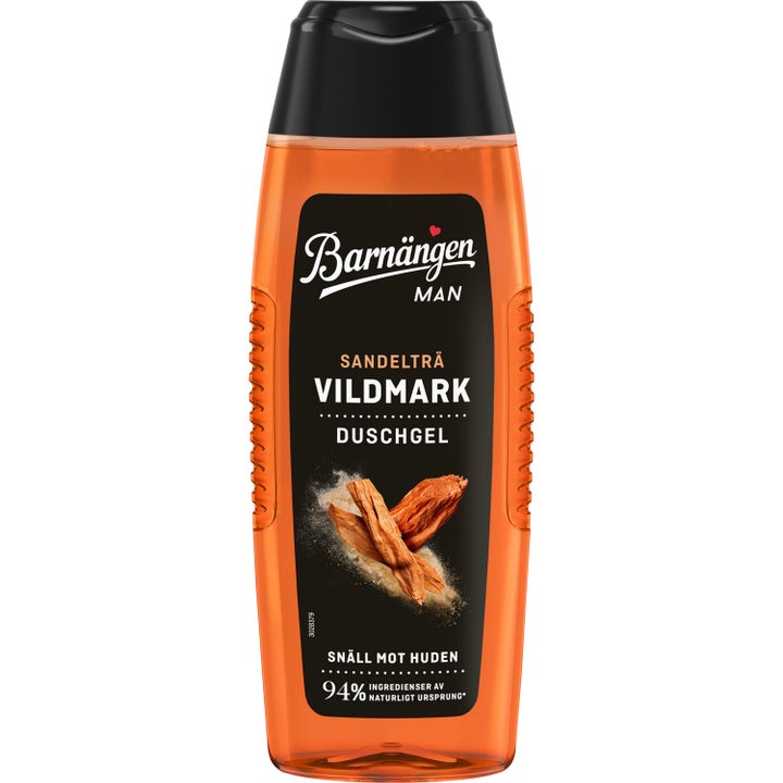 Barnängen Man Vildmark duschgel er mild mod huden i en orange gennemsigtig flaske med sort låg og sandeltræ.