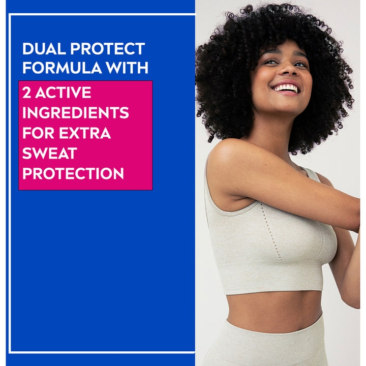 NIVEA Dry Comfort 25 ml roll-on med Dual Protect Formula og en smilende kvinde i træningstøj.