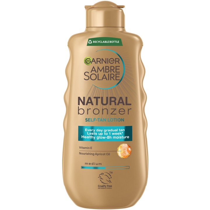Garnier Ambre Solaire Natural Bronzer 200 ml selvbruner lotion der giver glød i en gylden flaske med bølgede sider