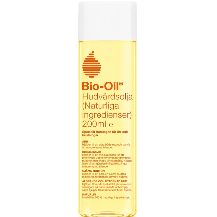 Bio-Oil Hudplejeolie Naturlig 200ml mod ar og strækmærker i klar plastflaske med gul olie og hvidt låg.