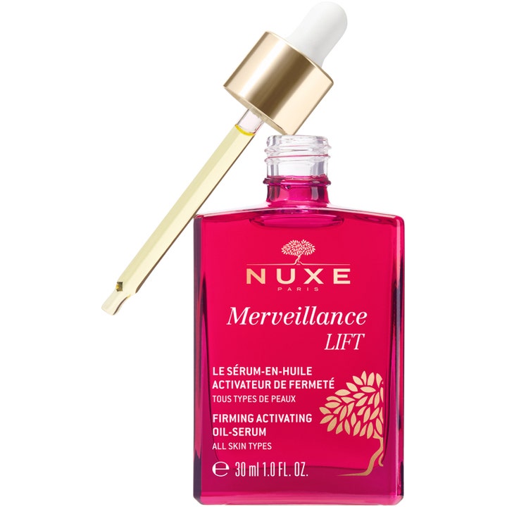 Nuxe Merveillance LIFT 30 ml opstrammende ansigtsserum i pink glasflaske med guldpipette og synlig gul olie