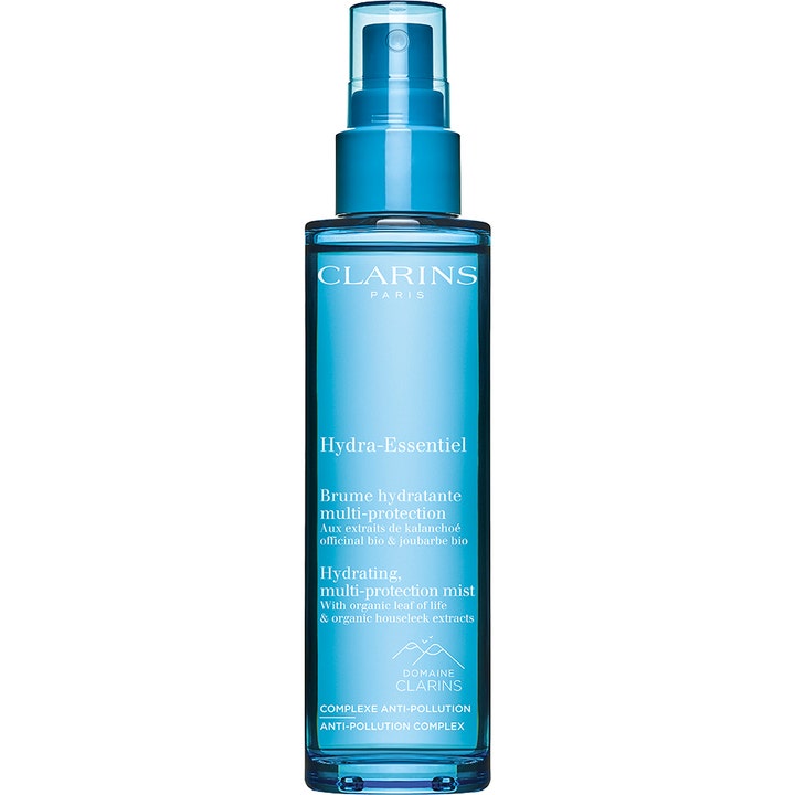 Clarins Hydra-Essentiel Mist 75 ml fugtgivende ansigtsspray i en klar blå sprayflaske med gennemsigtigt låg.