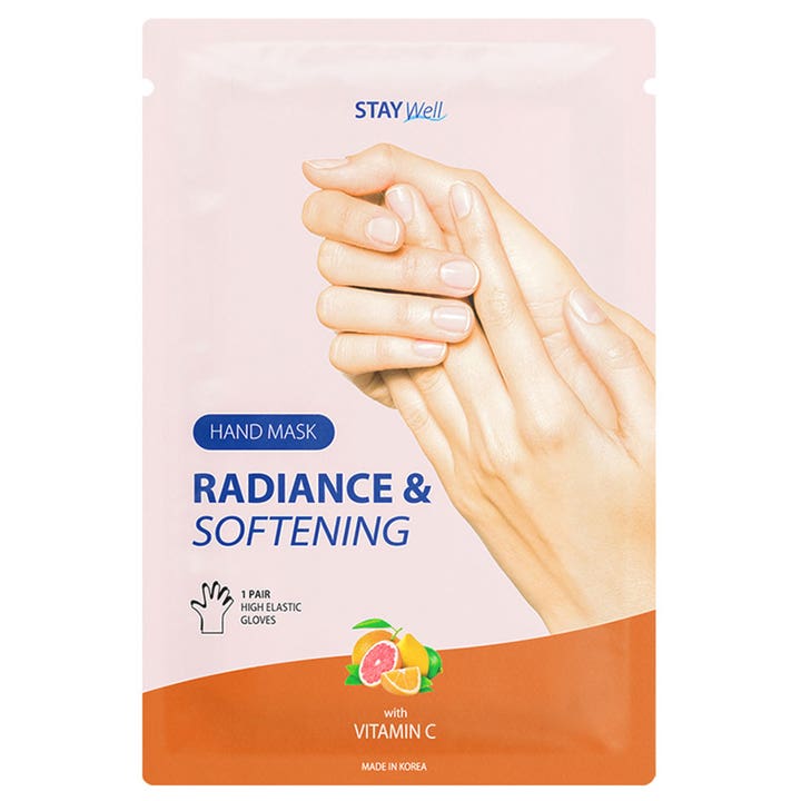 Stay Well Radiance & Softening Hand Mask 1 par blødgørende håndmaske med C-vitamin i lyserød sachet med hænder