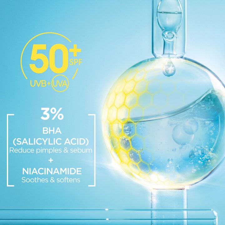 Garnier Skin Active Pureactive UV Daily Fluid 40 ml solcreme til ansigtet med 3% BHA og SPF 50 i en laboratoriekolbe