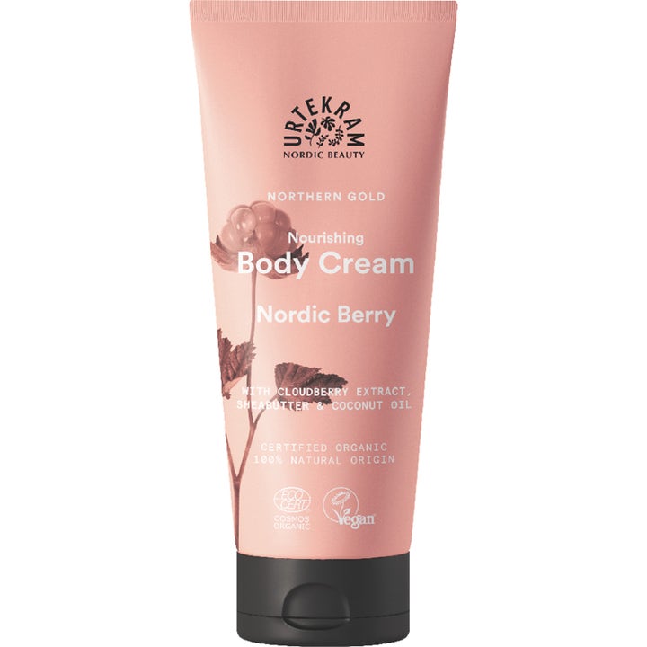 Urtekram Nordic Berry Nourishing Body Cream nærende kropscreme i en ferskenfarvet tube med sort låg.