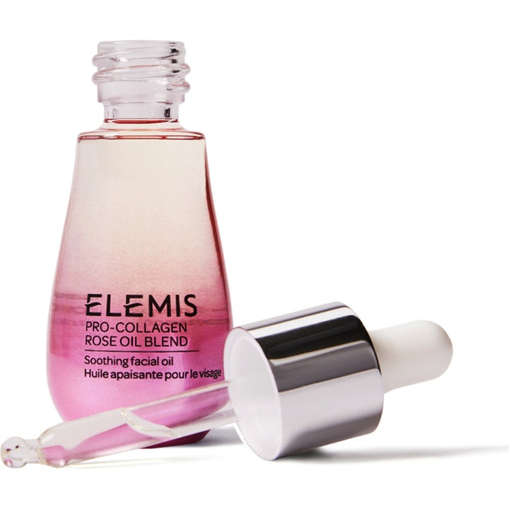 Elemis Pro-Collagen Rose Oil Blend 15 ml beroligende ansigtsolie i pink glasflaske med løs sølvfarvet pipette