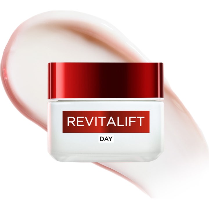 L'Oréal Paris Revitalift Day Cream 50 ml opstrammende dagcreme i hvid krukke med rødt låg og cremet tekstur