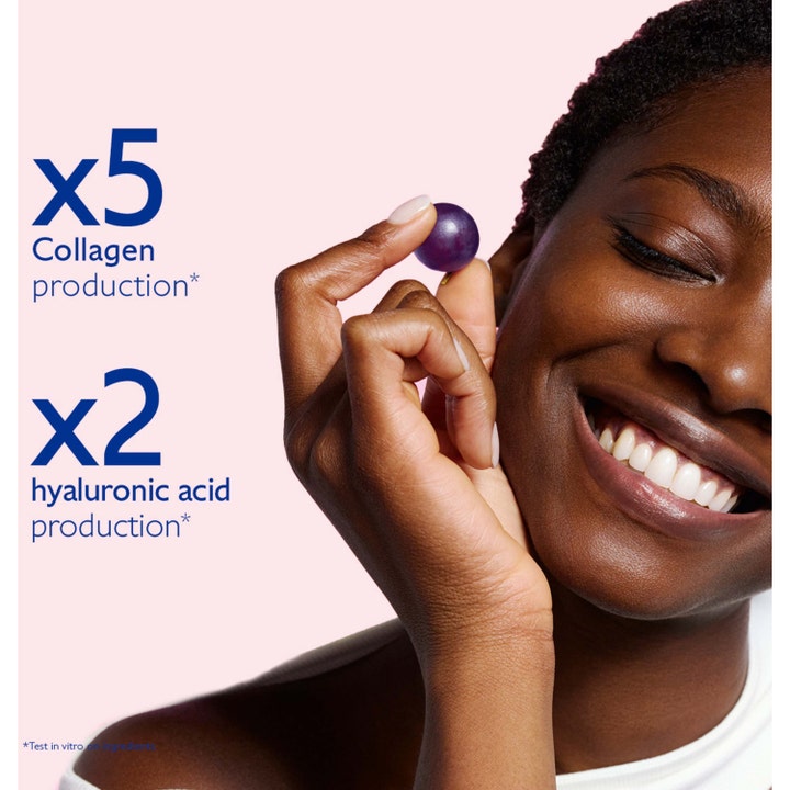 Caudalie Resveratrol-Lift 40 ml opstrammende dagcreme øger collagen og hyaluronsyre vist med kvinde og drue.