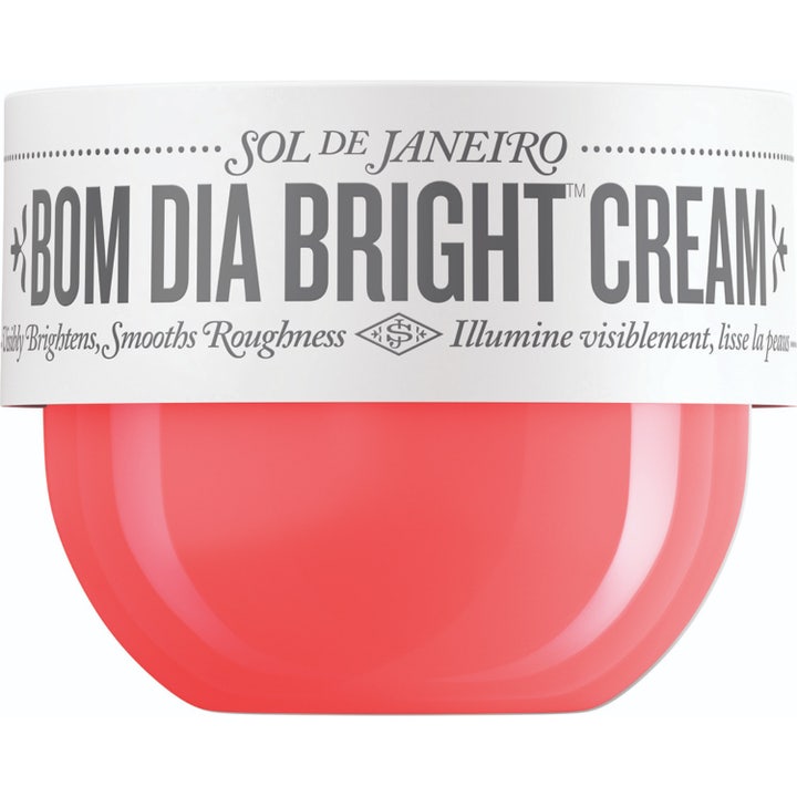 Sol de Janeiro Bom Dia Bright Cream eksfolierende kropscreme i koralrød krukke med hvidt låg og Vitamin C