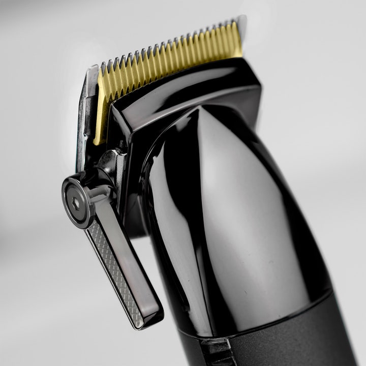 BaByliss Super X Metal Hair Clipper 1 stk hårklipper til præcis trimning med guldfarvede skær og sort metalhus
