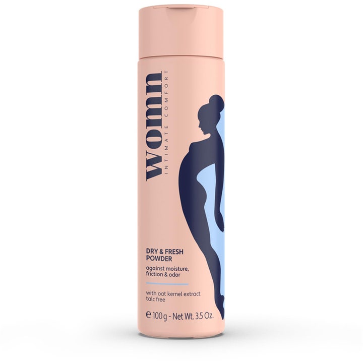 Womn Dry & Fresh Powder 100g intimpudder mod fugt og lugt i en lyserød plastflaske med blå kvindesilhuet