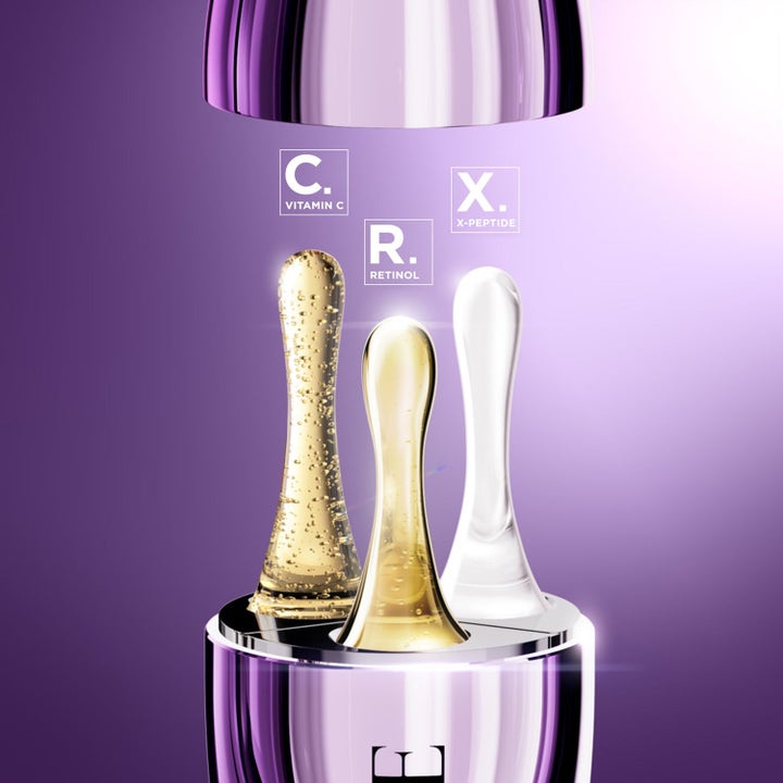 Lancôme Rénergie Serum hudpleje med tre aktive formler af vitamin C, retinol og peptider i en lilla flakon.