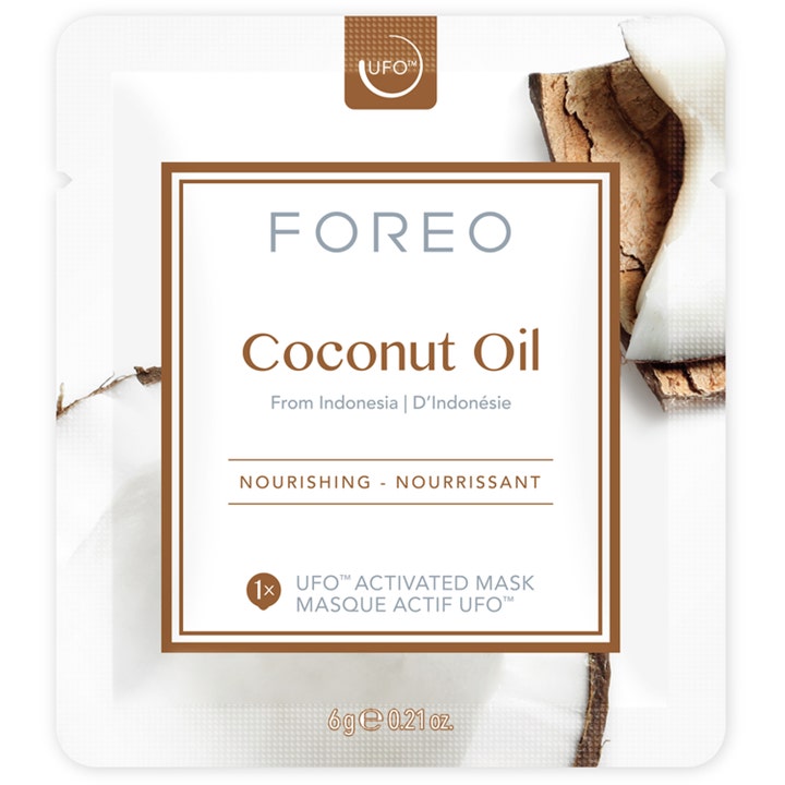 FOREO UFO Mask Coconut Oil 6 g nærende sheet maske i hvid sachet dekoreret med friske kokosstykker.