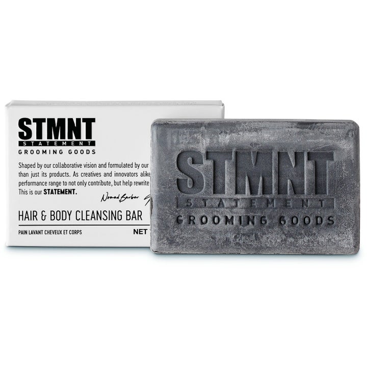 STMNT Hair & Body Cleansing Bar rensende sæbebar til hår og krop i grå marmoreret finish ved hvid æske