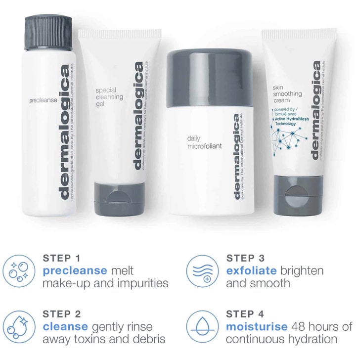 Dermalogica Discover Healthy Skin Kit ansigtssæt med fire hvide produkter til rens, eksfoliering og intens fugt.