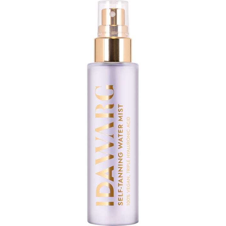 Ida Warg Self-Tanning Water Mist 75ml selvbruner giver glød i en lys lilla frostet flaske med guldskrift