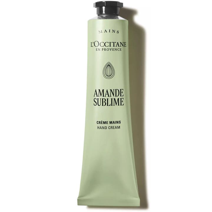 L'Occitane Amande Delicious Hands 75 ml blødgørende håndcreme i grøn tube med mandelekstrakt.