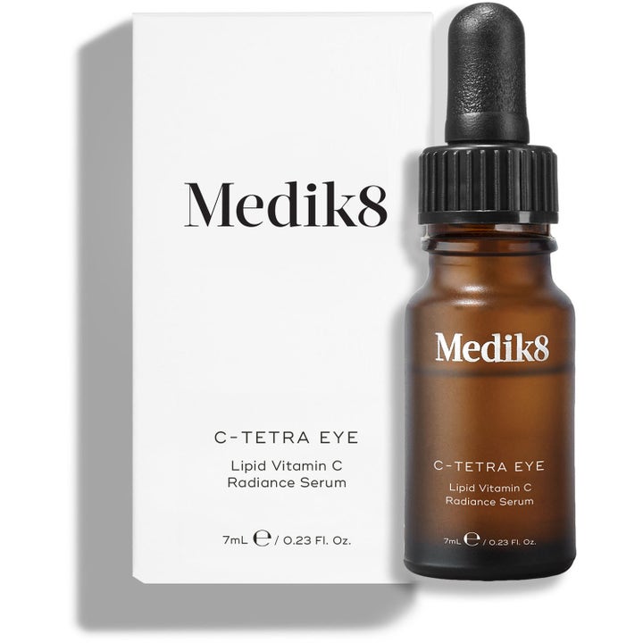 Medik8 C-Tetra Eye 7 ml øjenserum i brun glasflaske med pipette foran hvid æske.