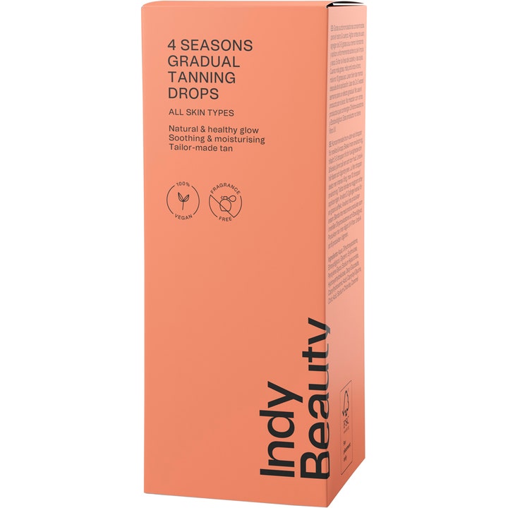 Indy Beauty Gradual Tan Drops 30 ml brun uden sol i ferskenfarvet emballage giver en sund glød
