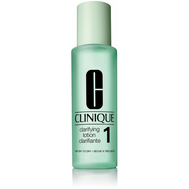 Clinique Clarifying Lotion 1 eksfolierende ansigtspleje i lysegrøn frostet flaske med lysegrønt låg