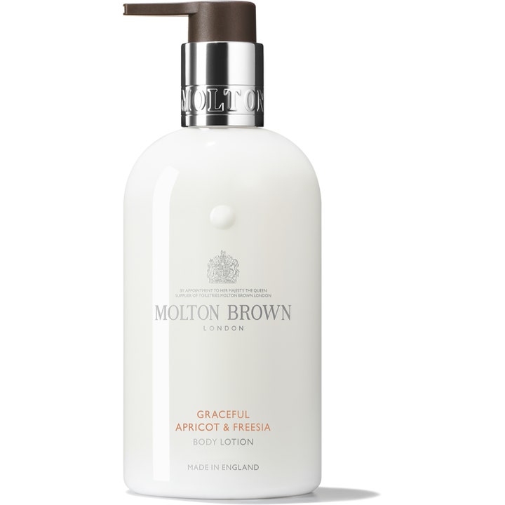 Molton Brown Graceful Apricot & Freesia fugtgivende kropslotion til hudpleje i hvid flaske med sølvfarvet pumpe
