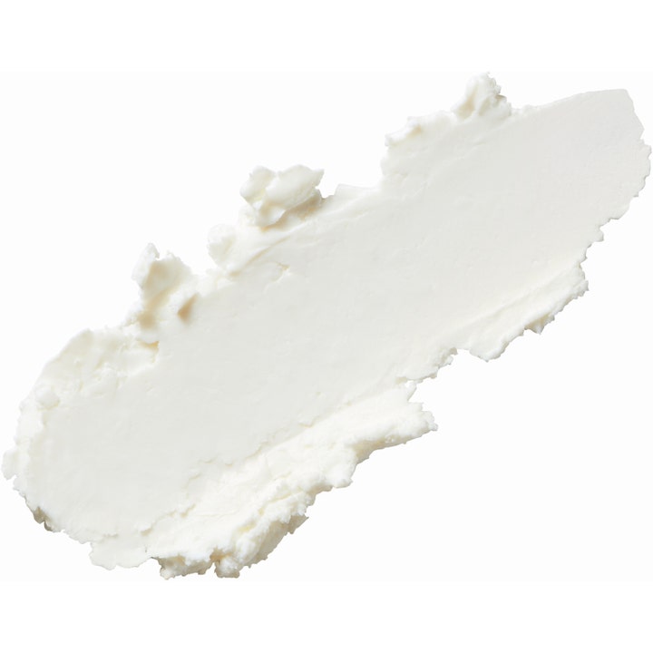 Make Prem UV Defense Me Calming Sun Stick 20 g beroligende solcreme til ansigtet med en hvid og cremet tekstur.