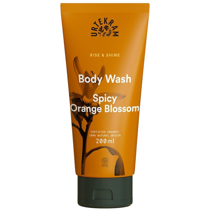 Urtekram Spicy Orange Blossom Body Wash 200 ml opfriskende kropspleje i orange tube med mørkt låg og blomstermotiv