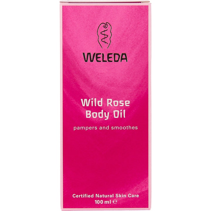 Weleda Wild Rose Body Oil 100 ml i pink papæske der plejer og udglatter huden med naturlige olier