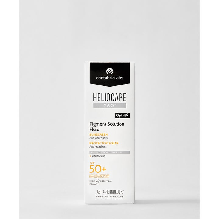 Heliocare Pigment Solution Fluid 50 ml solcreme mod pigmentpletter i hvid papæske med SPF 50 og niacinamid