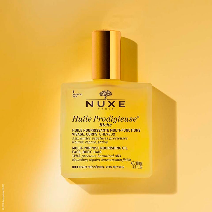 Nuxe Huile Prodigieuse Riche 100 ml nærende kropsolie i firkantet glasflaske med guldhætte