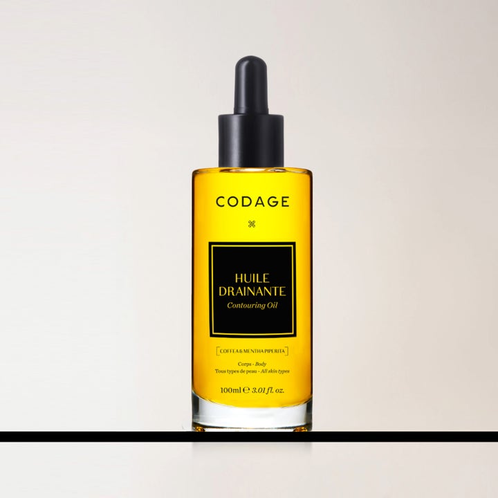 Codage Paris Relaxing Oil 100 ml afslappende kropsolie i glasflaske med gul olie og sort pipette.