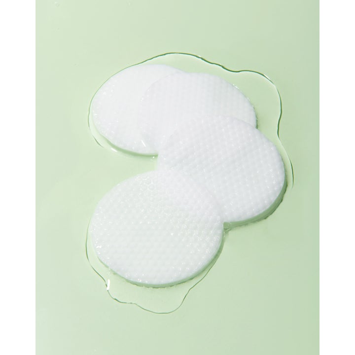 Banila Co Clean It Zero Green Peel Toner Pad 70 stk eksfolierende toner pads med hvide teksturerede rondeller i klar væske