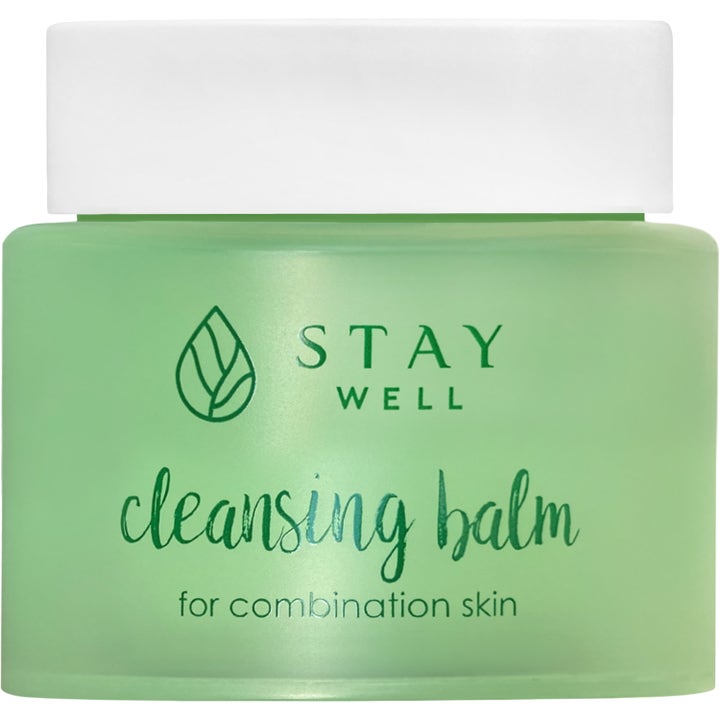 Stay Well Cleansing Balm 100 ml til kombineret hud er en dybderensende ansigtsrens i en lysegrøn krukke med hvidt låg.