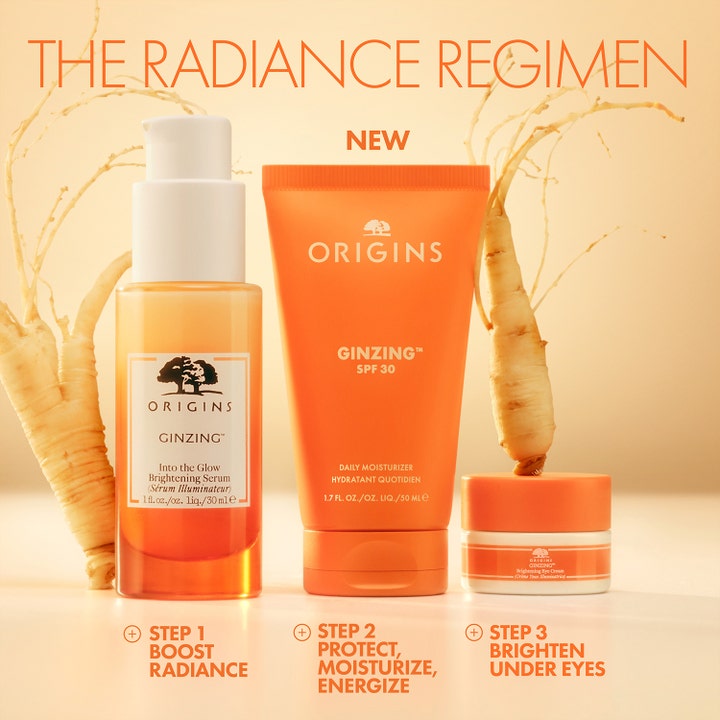 Origins Ginzing SPF30 Daily Moisturizer 50 ml fugtgivende solcreme i orange tube vist med ginsengrødder