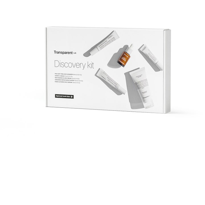 Transparent Lab Discovery Kit 5 stk hudplejesæt i hvid æske med små hvide tuber og en lille brun glasflaske.