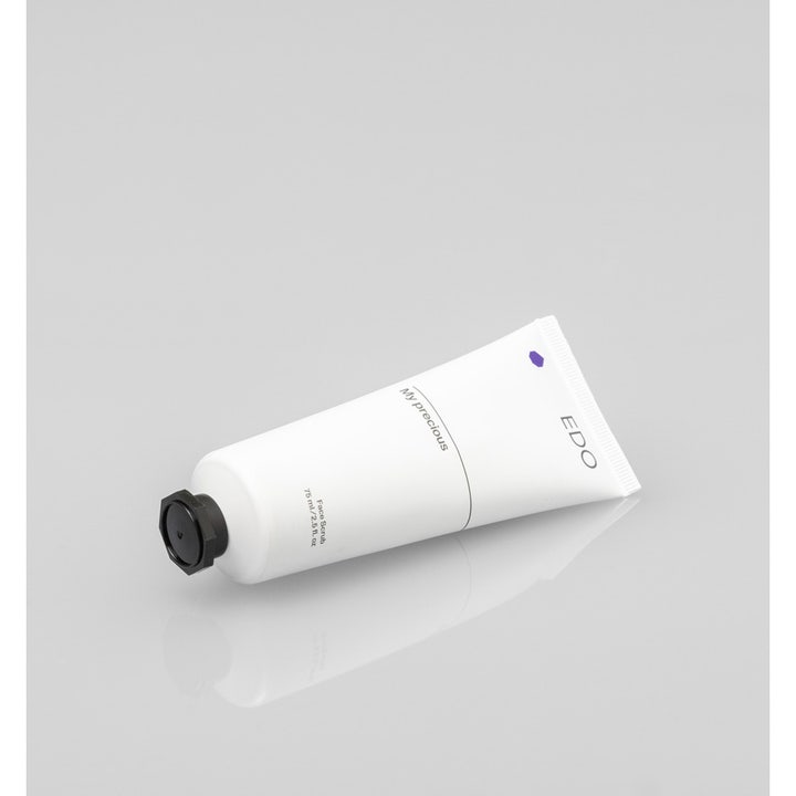 EDO My Precious Face Scrub 75 ml eksfolierende ansigtsskrubb i en hvid tube med et sort ottekantet låg