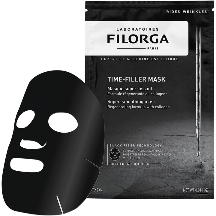 Filorga Time-Filler Mask 23 g udglattende sheet mask i sort fiber ved siden af mørk emballage