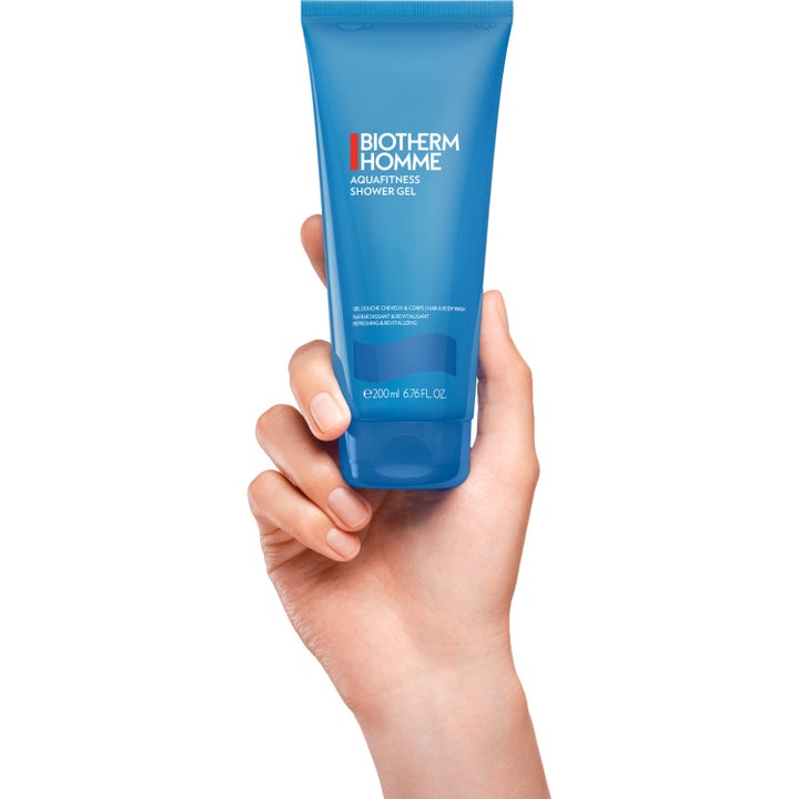 Biotherm Homme Aquafitness 200 ml opfriskende showergel i nyt turkis design vist ved siden af det gamle design