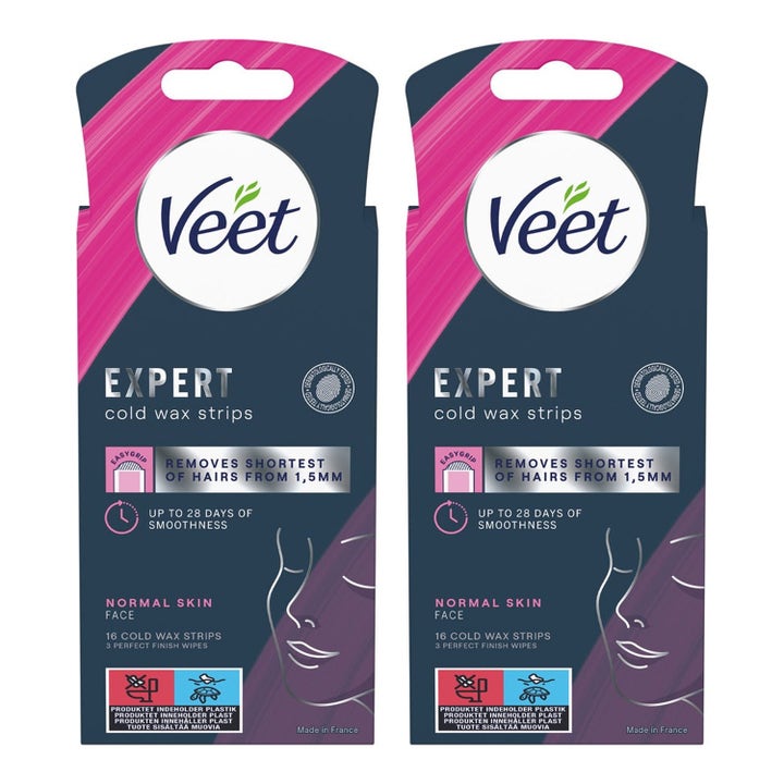 Veet Expert koldvoksstrips 16 stk til ansigtet giver glat hud i mørkeblå pakker med lyserøde grafiske detaljer