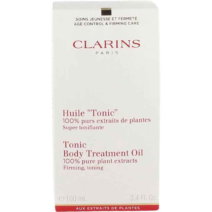 Clarins Tonic Body Treatment Oil 100 ml opstrammende kropsolie i hvid papæske med rød tekst