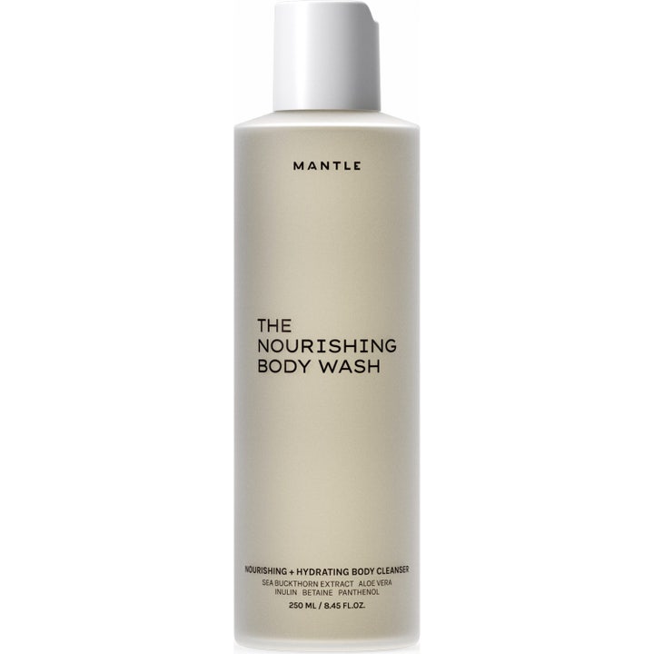 Mantle The Nourishing Body Wash 250 ml plejende kropsvask i en minimalistisk beige flaske med hvidt låg