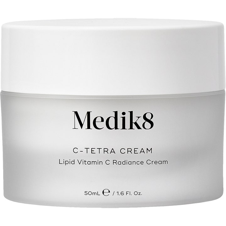 Medik8 C-Tetra Cream 50ml glødgivende ansigtscreme med C-vitamin i en frostet glaskrukke med hvidt låg.