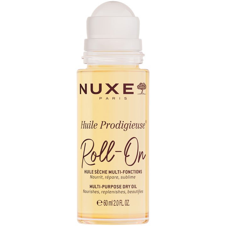Nuxe Huile Prodigieuse Roll-On 60 ml nærende tørolje i klar flaske med gylden olie og hvid applikator