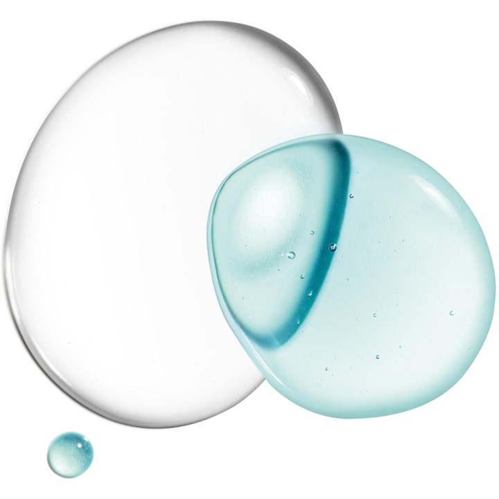 Clarins Instant Eye Make-Up Remover 125 ml sminkefjerner med en to-faset tekstur af klare og lyseblå dråber
