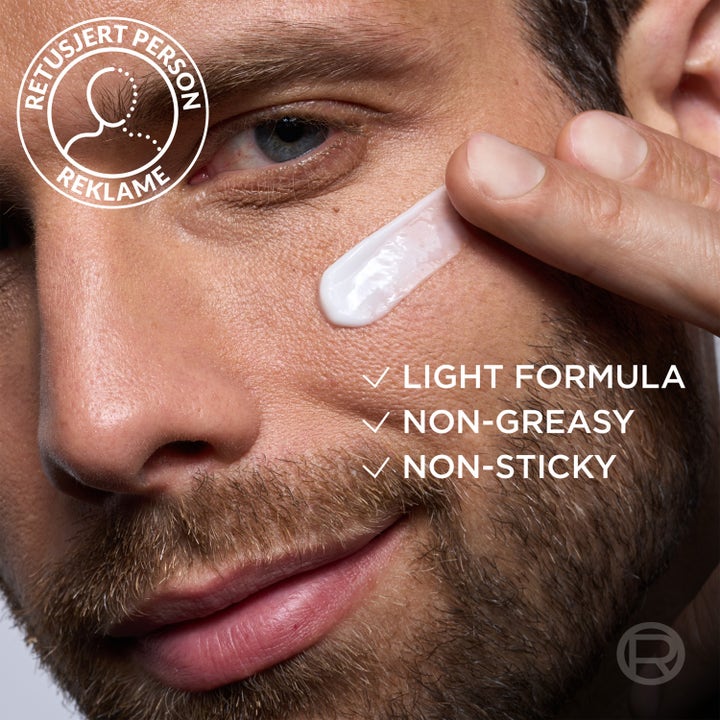 L'Oréal Paris Men Expert Power Age 50 ml revitaliserende ansigtscreme med let hvid tekstur på huden.