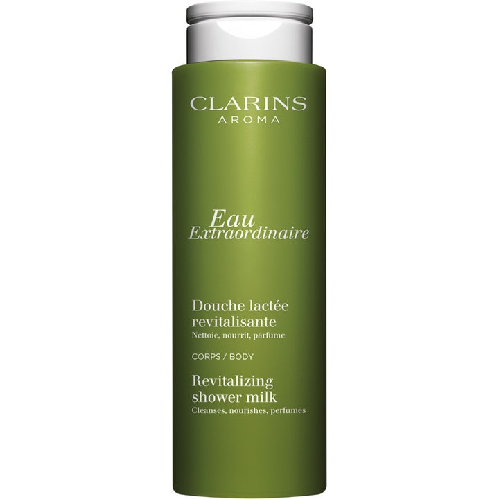 Clarins Eau Extraordinaire Revitalizing Shower Milk 200 ml plejende kropsvask i grøn flaske med hvidt låg