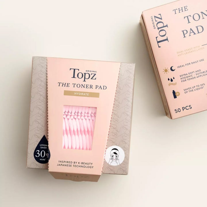 Topz Premium The Toner Pad 50 stk fugtgivende rondeller i lyserød emballage med k-beauty teknologi